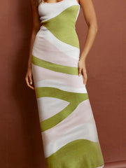 Geometric knit maxi slip dress in white, green, and pink wavy stripes.