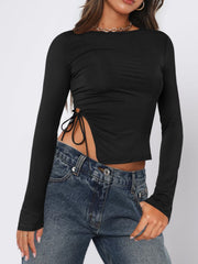 Black long sleeve ruched top with adjustable side tie detail