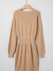 Tan ribbed knit sweater dress with long sleeves and a cinched waist.