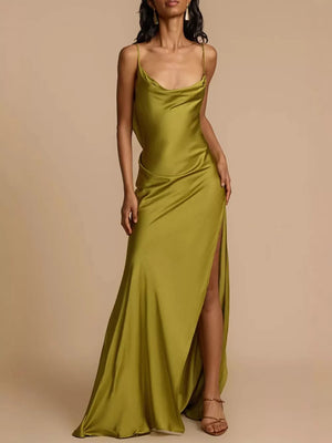 Lustrous satin maxi dress with cowl neck, spaghetti straps, and high slit.