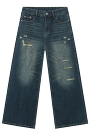 Distressed baggy dark wash denim jeans with a wide leg and whiskering details.
