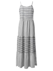 Light gray tiered maxi dress with horizontal and vertical stripe patterns and cami straps.