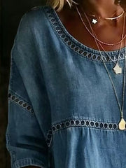 Blue denim maternity t-shirt with openwork trim and scoop neck.