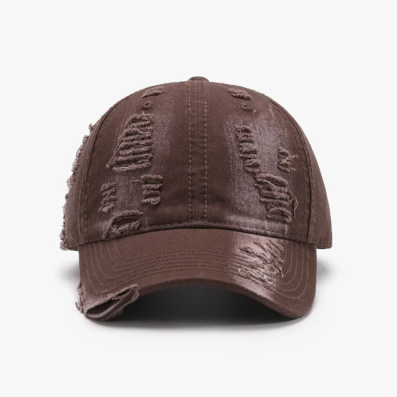 Distressed canvas baseball cap in coffee brown with ripped details.