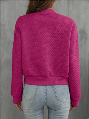 Diamond quilted bomber jacket in Deep Rose with ribbed cuffs and hem.