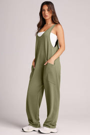 Relaxed fit tank jumpsuit in Matcha Green with deep pockets and a V-neck.