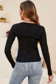 Black open-knit bolero sleeve top with diamond pattern and long sleeves.