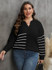 Black knit sweater with collar detail and white horizontal stripe accents