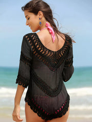 Black chevron crochet V-neck cover-up with fringe detail and elbow-length sleeves.
