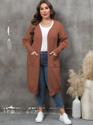 Brown oversized knit duster cardigan with patch pockets and a relaxed fit.