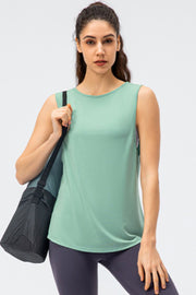 Turquoise performance tank top with a scoop neck and strappy back detail.
