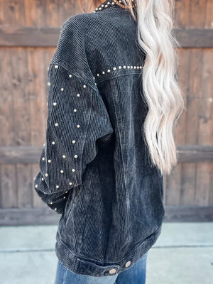 Black corduroy jacket with pearl stud details on shoulders and sleeves