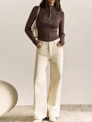 Chocolate ribbed zip-up cardigan with mock neck and long sleeves.