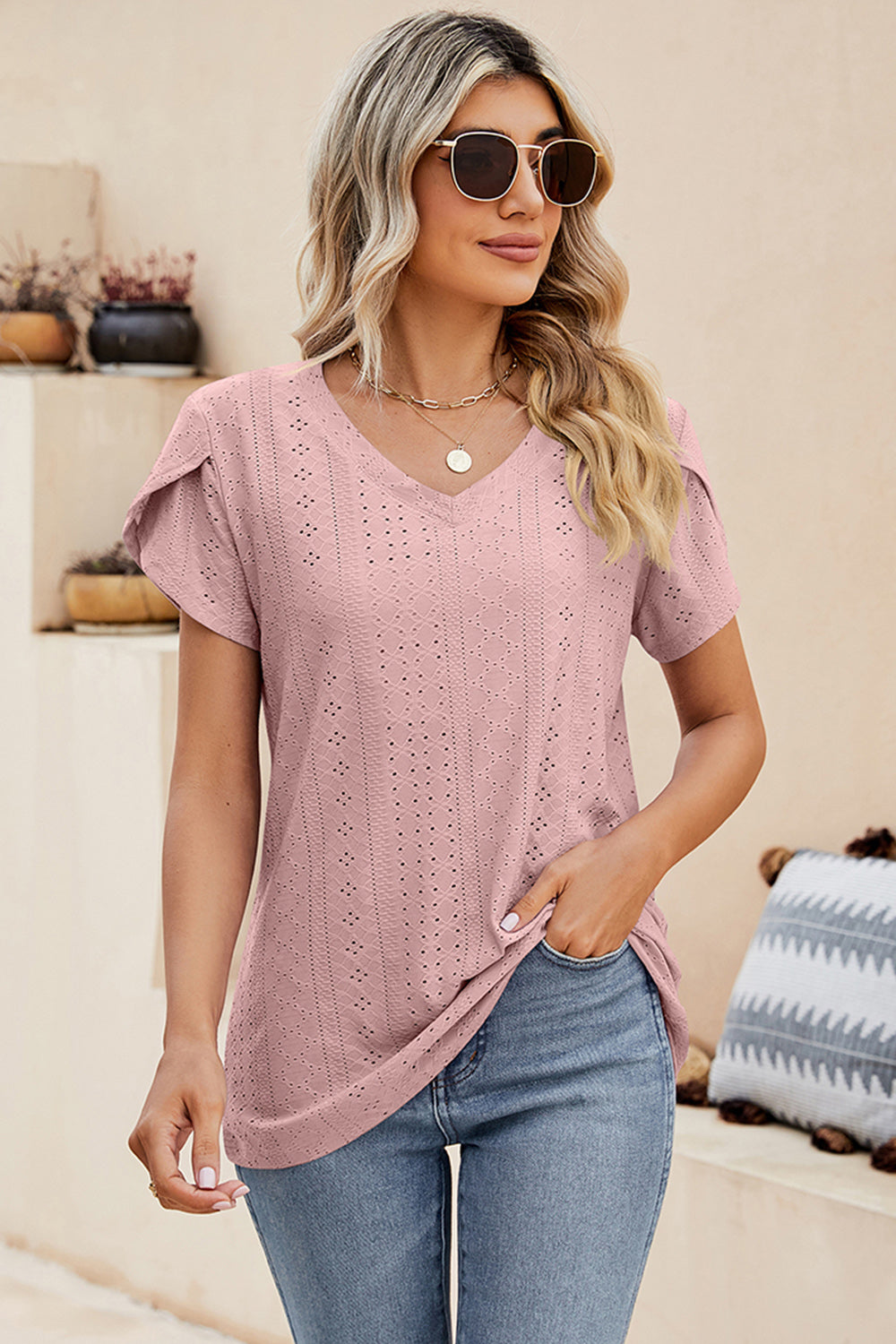 Dusty Pink eyelet sleeve detail V-neck top with allover openwork pattern.