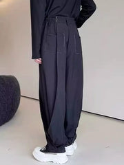 Men's Loose Fit Pants in Black, model styling view