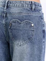 Wide-leg denim jeans in blue with a heart-shaped back pocket detail.