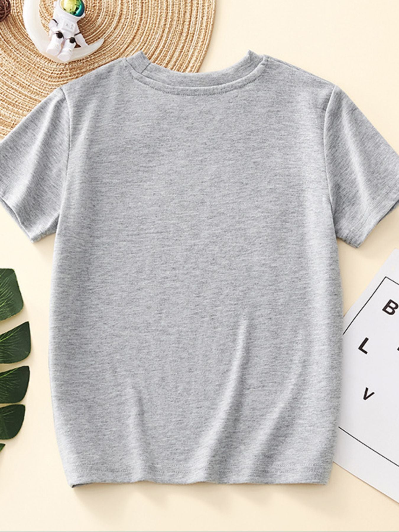 Toddler grey crew neck t-shirt with short sleeves.