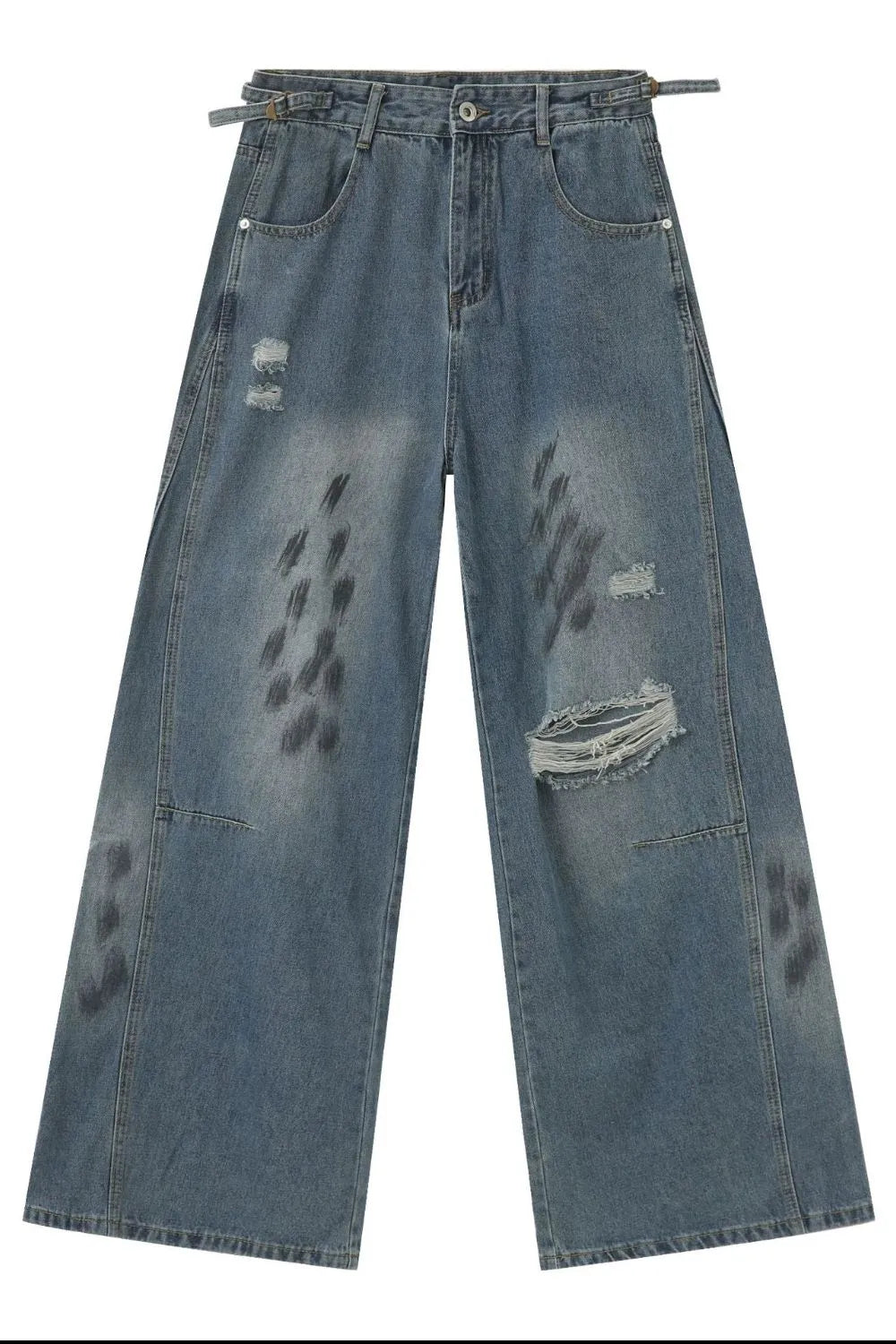 Medium wash relaxed fit denim jeans with distressed details and graphic print.