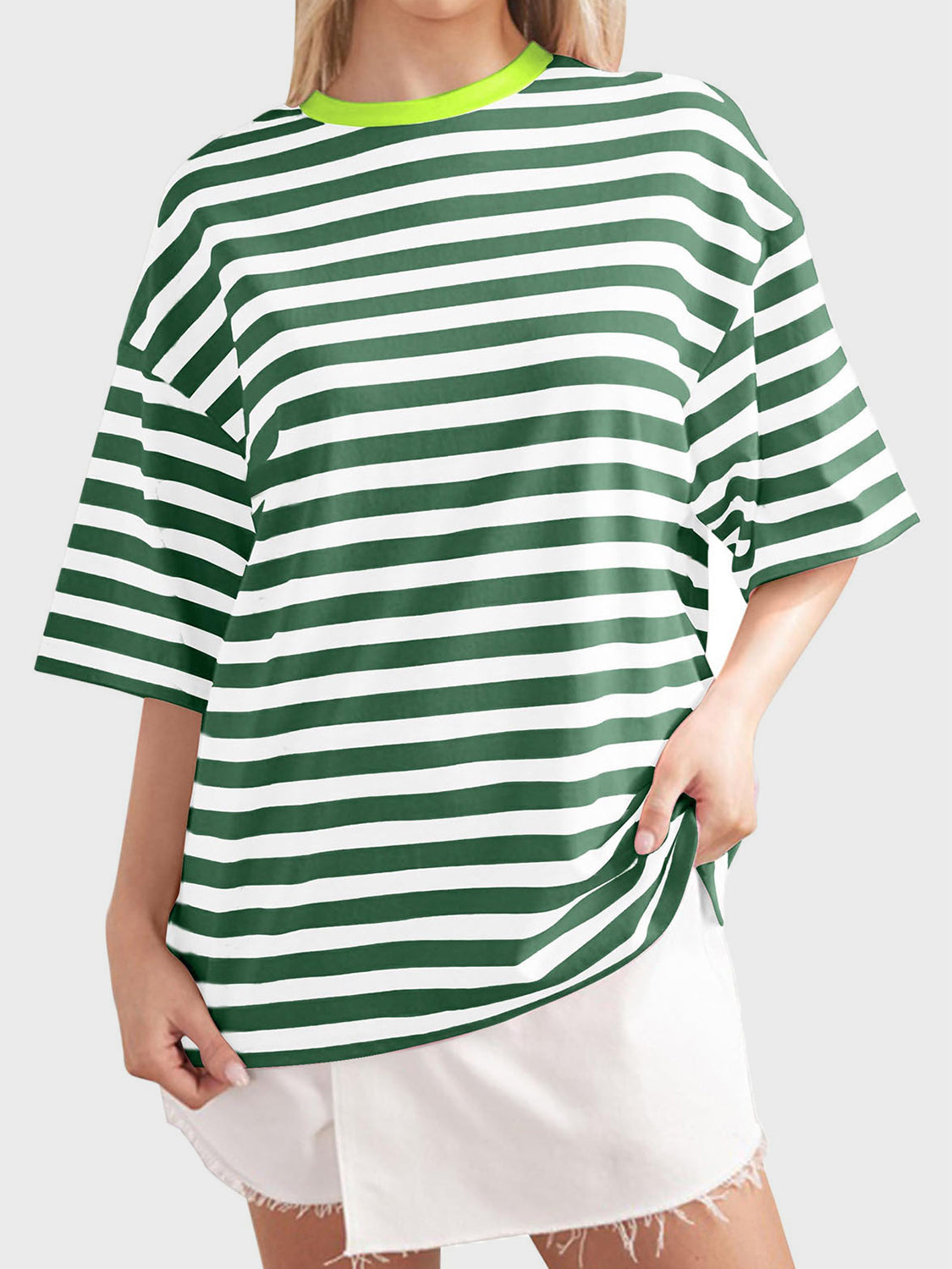Oversized green and white striped tee with dropped sleeves and a neon green neckline.