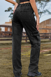 Black denim cargo pants with utility pockets and elastic waistband.