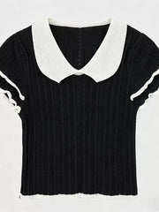 Black maternity t-shirt with white Peter Pan collar and ruffled cuffs.