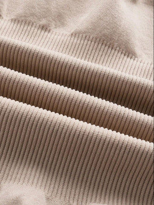 Ribbed contour shaping bodysuit in Dust Storm fabric with vertical ribbing detail.