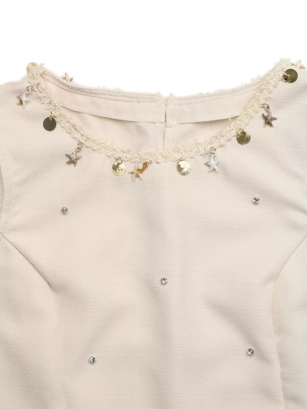 Cream linen two-piece set with embellished neckline and scattered rhinestones.