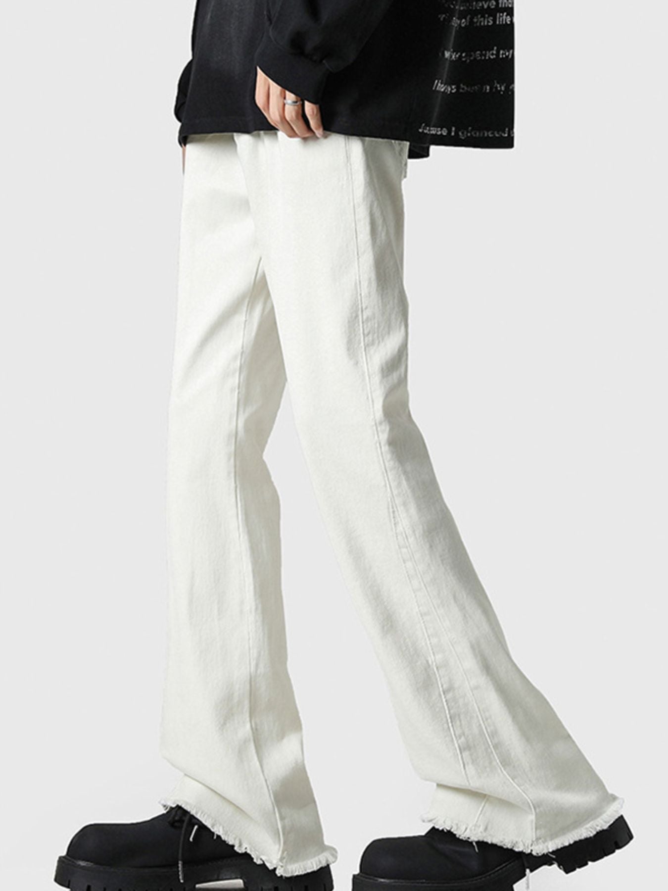 Men's white 100 cotton flare jeans with raw hem detail