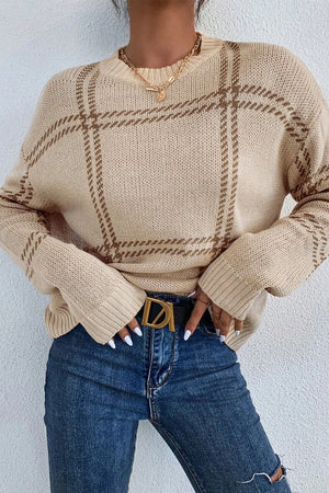 Tan gridline knit crewneck pullover sweater with brown plaid pattern.