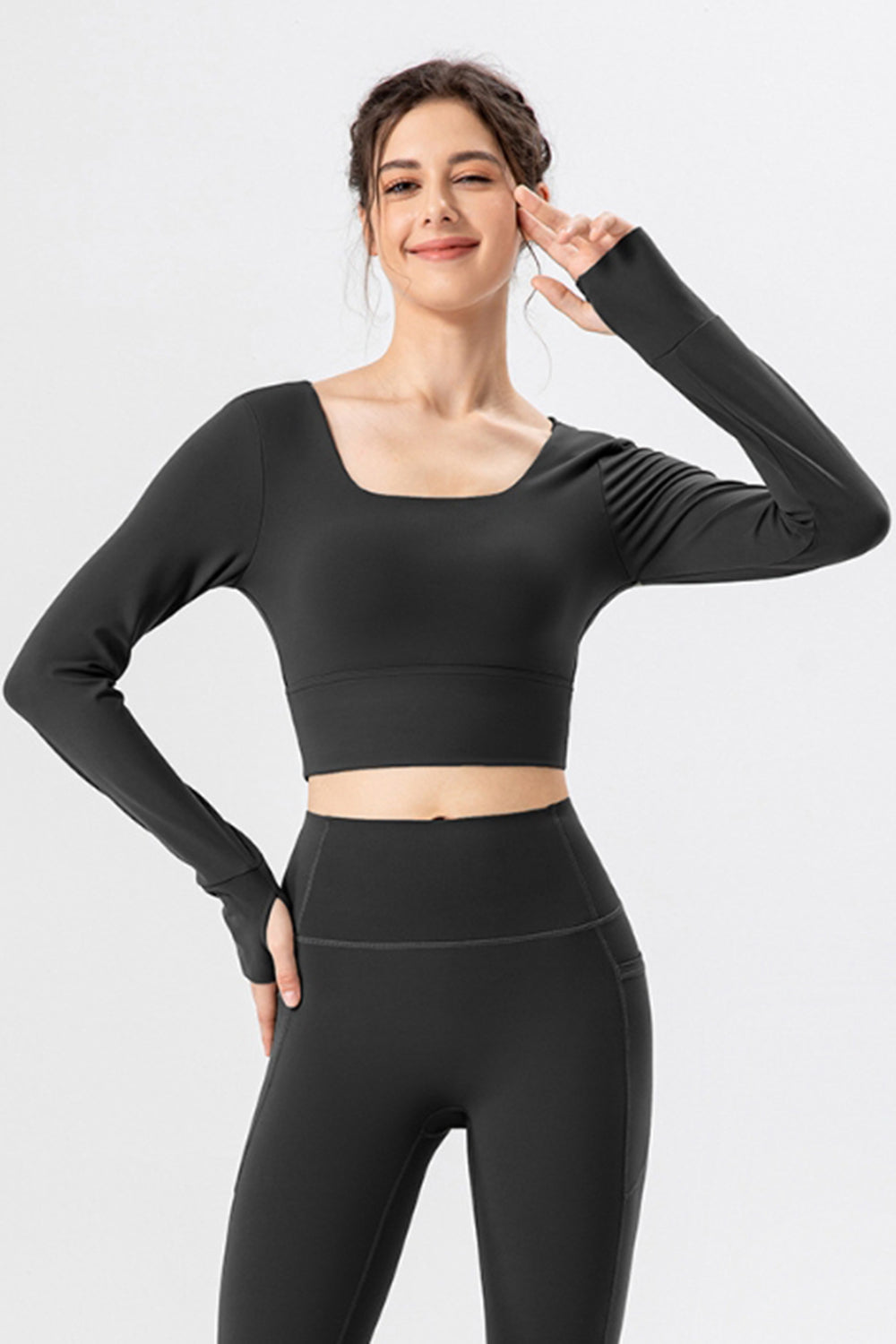 Black long sleeve crop top with thumbholes and square neckline