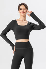 Black long sleeve crop top with thumbholes and square neckline