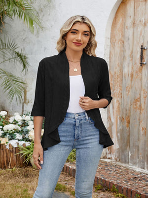 Black eyelet cascade cardigan with waterfall hem and elbow sleeves.