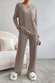 Cozy ribbed knit lounge set in camel with V-neck sweater and wide-leg pants.