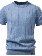 Light blue ribbed knit sweater with vertical seam details and crew neck.