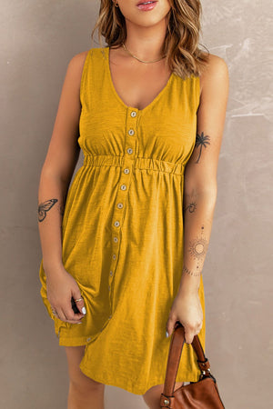 Yellow button-down mini dress with gathered waistline and V-neck.