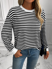 Horizontal stripe crewneck sweatshirt with white cuffs and crewneck.
