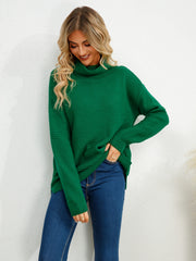 Textured knit oversized turtleneck pullover in dark green, acrylic, with a relaxed fit and casual styling.