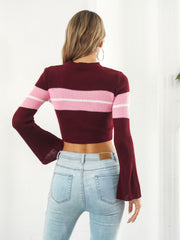 Flared sleeve stripe crop knit sweater in wine with pink and white stripes.