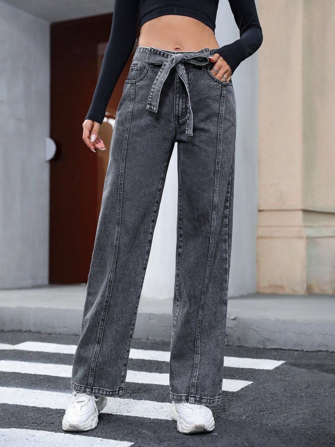 Belted wide-leg washed denim trousers in dark gray with a tie waist.