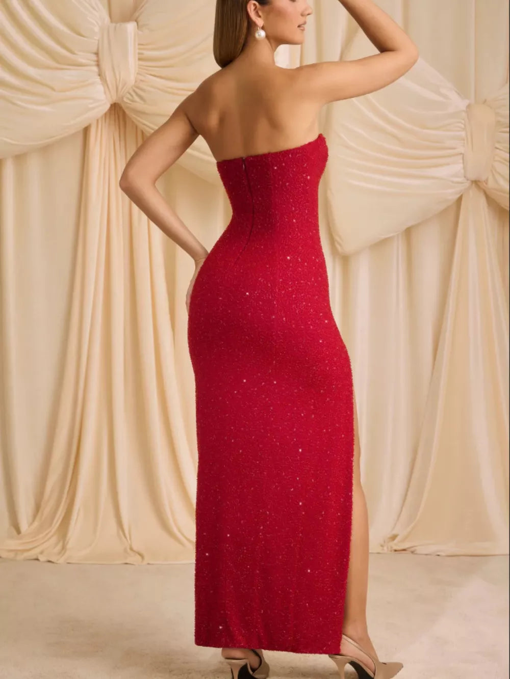 Red strapless sequin maxi dress with a high slit, polyester.