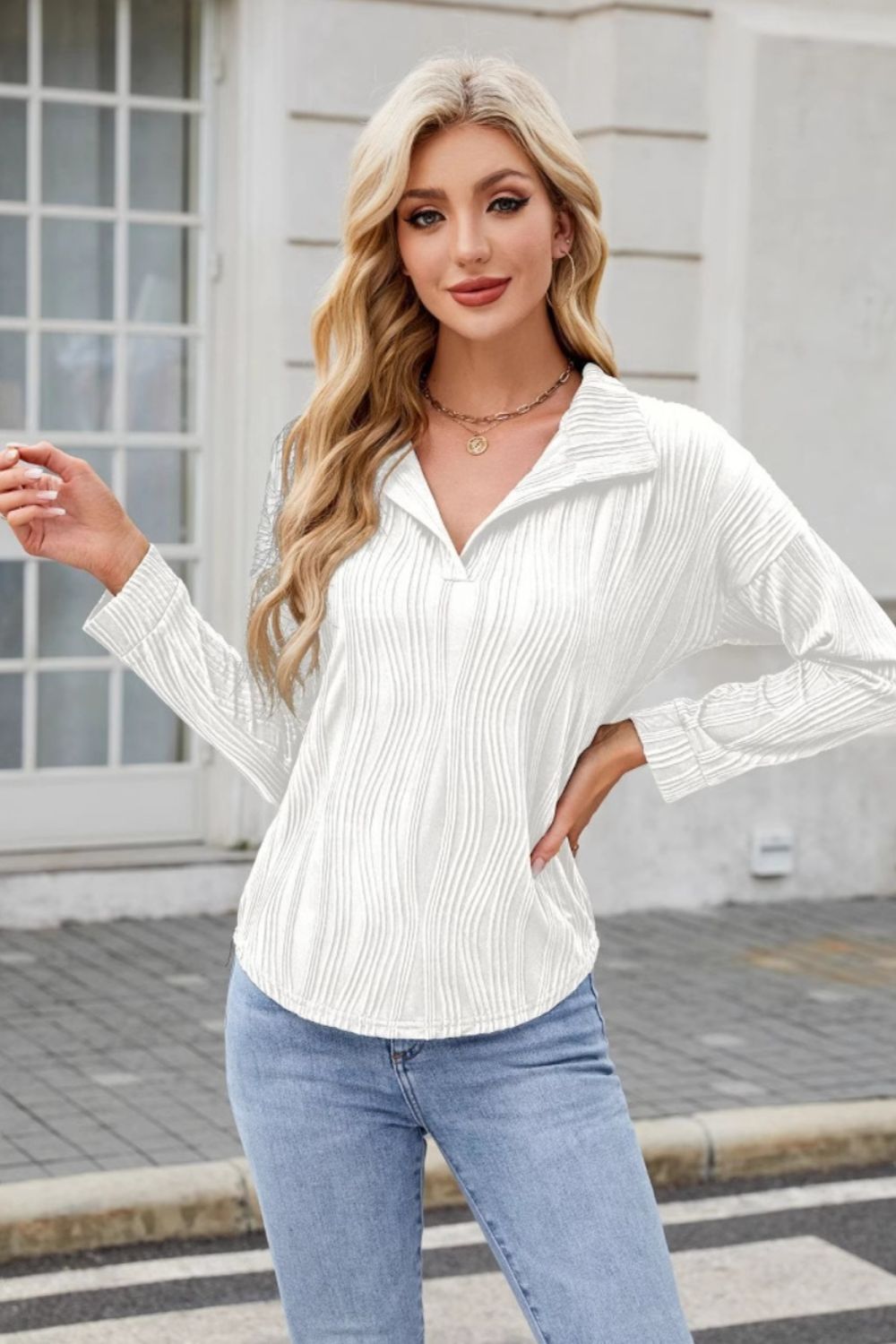 White long sleeve collared blouse with wave-effect texture