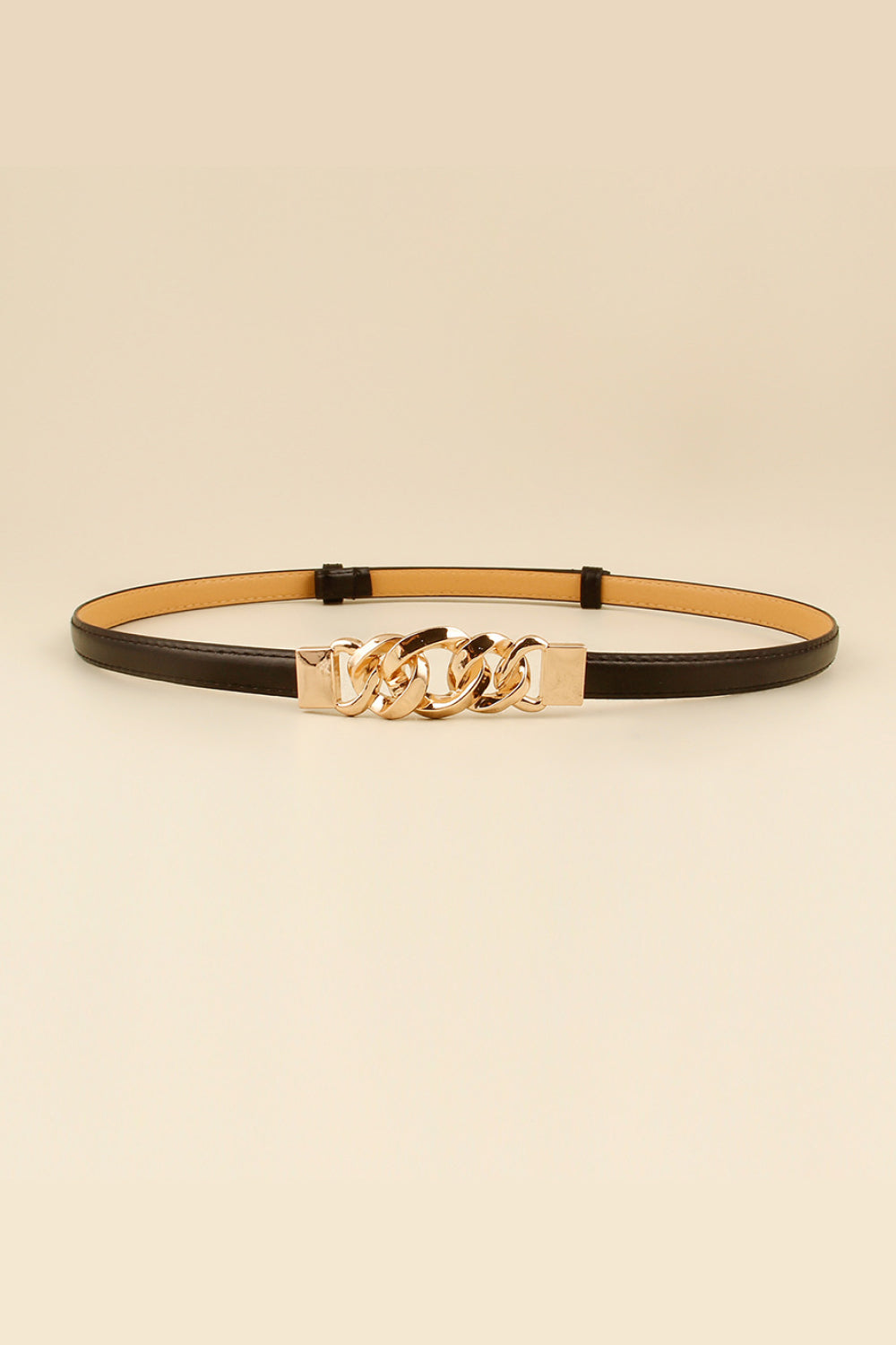 Black leather belt with gold chain link buckle detail