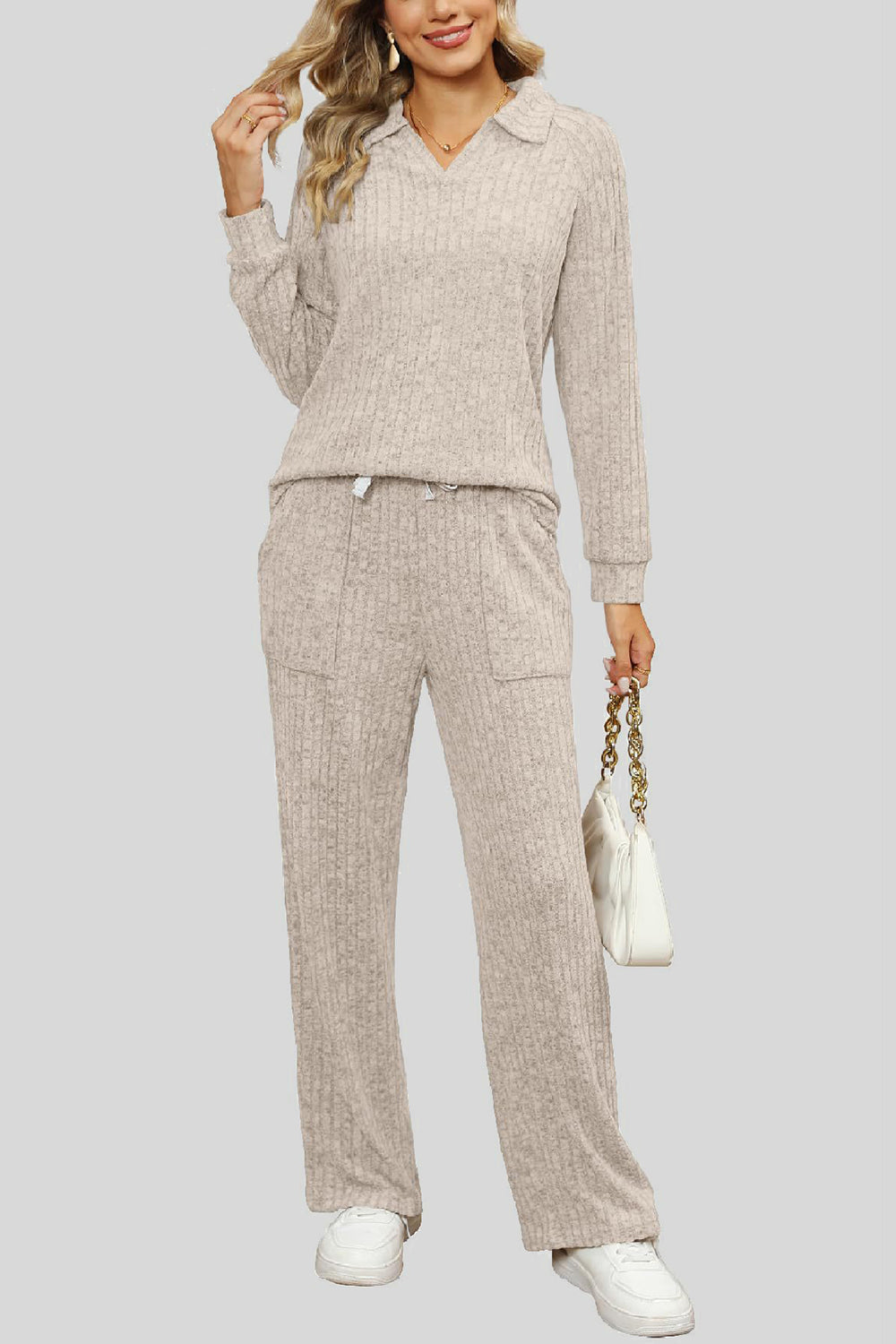 Ribbed knit lounge set in tan with collar, long sleeves, and wide leg pants.