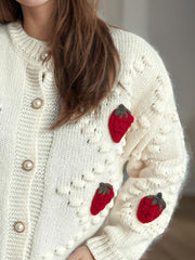 Cream knit cardigan with strawberry appliques and pearl buttons