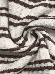 Waffle-knit striped polo t-shirt in brown and cream with open knit details.