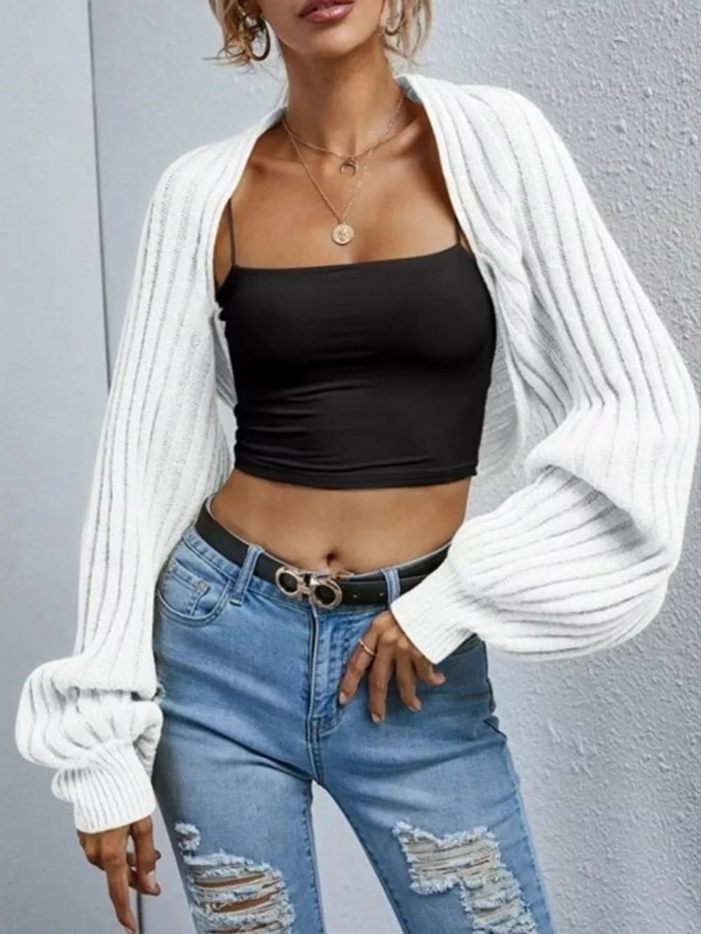 White balloon sleeve cropped knit cardigan with ribbed texture and open front