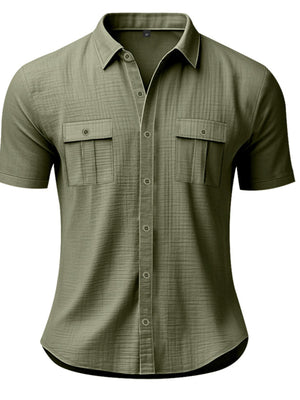 Military green short sleeve button-down shirt with two chest pockets and subtle texture.