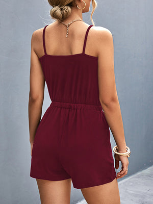 Burgundy chain-strap drawstring romper with elastic waist and short bottoms.