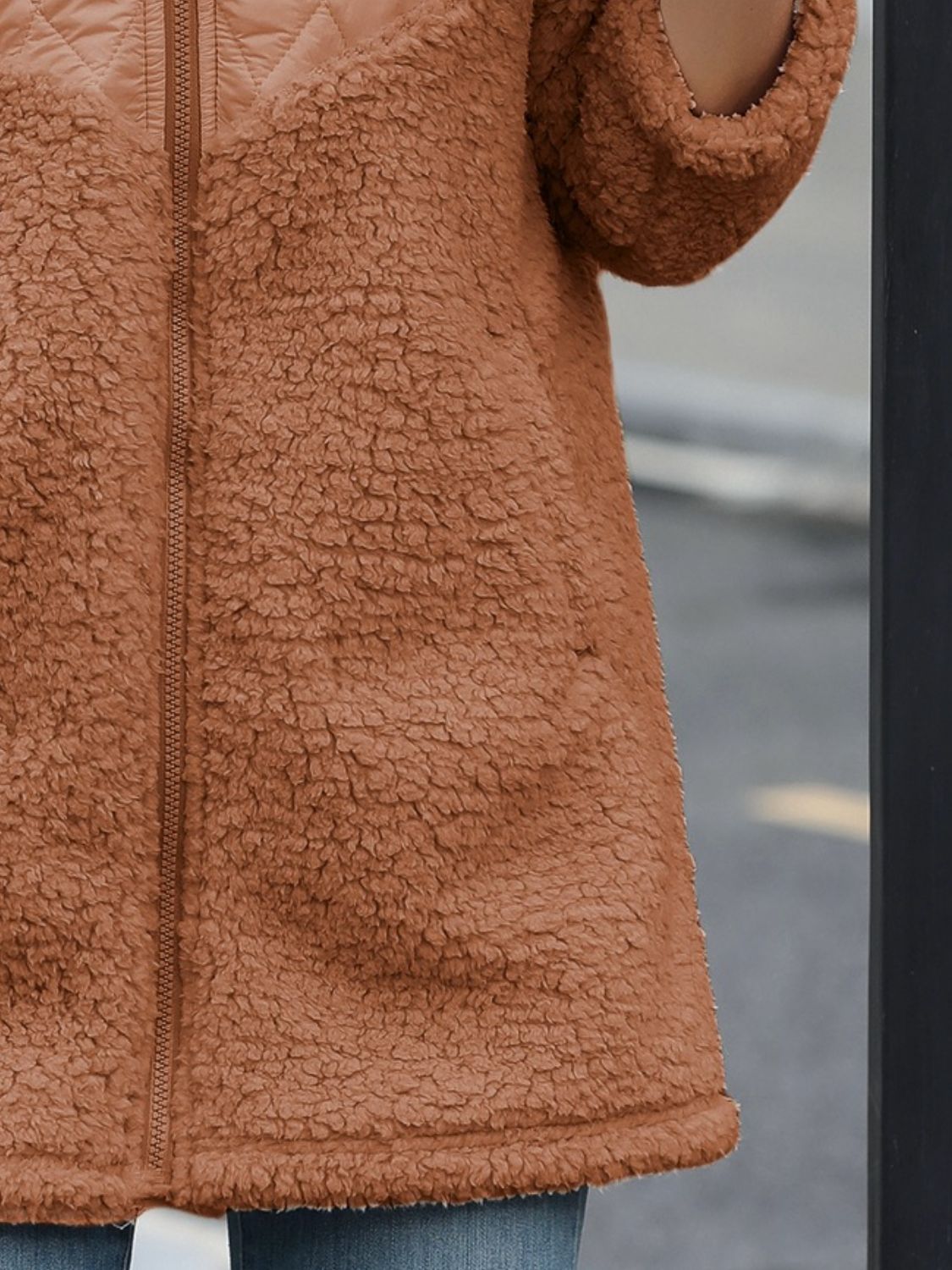 Caramel teddy fleece hoodie with quilted panel detail and zipper closure.