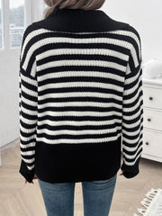 Black and white striped knit pullover sweater with wide collar.